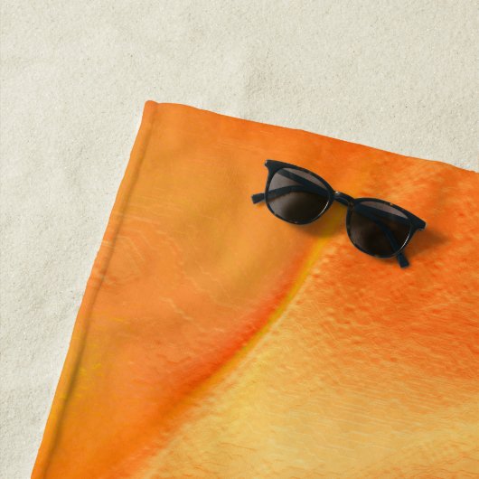 Klein geel en veel sinaasappel strandlaken (In situ)