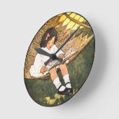 Klein meisje leest in een hammock ronde klok (Hoek)