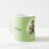 Klein meisje met een mok van een pushtoy koffie (Voorkant links)