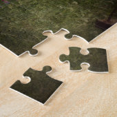 Klein meisje op een naai legpuzzel (Zijkant)