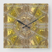 Klein metallistisch geel en helder glazen wandklok (Voorkant)