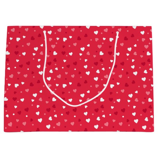 Klein roze en wit hart gepatterd groot cadeauzakje (Voorkant)