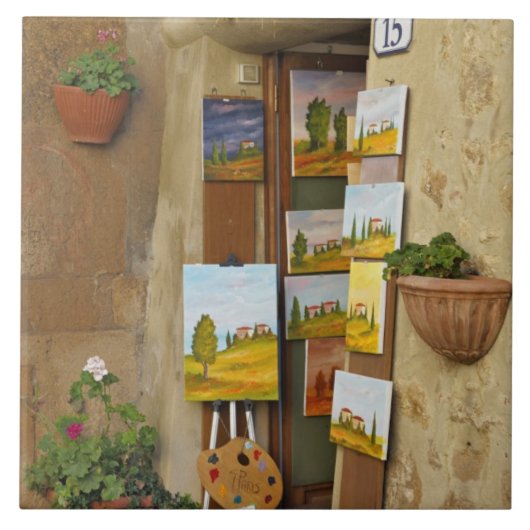 Klein shope met kunstwerk voor verkoop op stoep tegeltje (Voorkant)