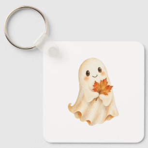 Klein spookje met een herfstblad sleutelhanger