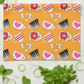 Kleine bekertjes in het keukenpatroon theedoek (Gevouwen)