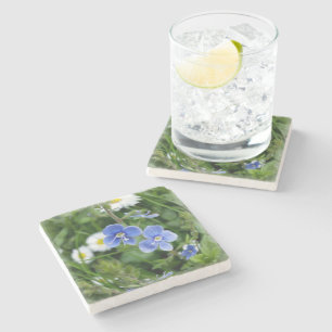 kleine blauwe bloemen stenen onderzetter