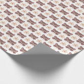 Kleine bruine wasbeer gezicht op wit cadeaupapier (Hoek)