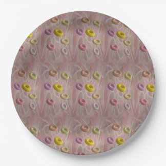 Kleine donuts vormen op een nevelvormige achtergro papieren bordje