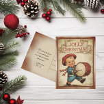 kleine drummer Boy Jolly Christmas Feestdagenkaart<br><div class="desc">Vind je favoriete vintage kerst briefkaart uit mijn collectie van prachtige retro afbeeldingen uit het verleden. Gelegen op een subtiel gekleurde achtergrond aan de voor- en achterkant,  met tekst op de achterkant die kan worden verwijderd of gepersonaliseerd. De kleine drummer Boy marcheert mee met de boodschap Jolly Christmas</div>