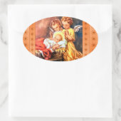 Kleine engeltjes bij de kribbe ovale sticker (Tas)