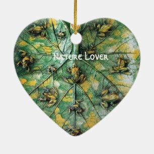 KLEINE FROGS OP EEN GROENE LEAF KERAMISCH ORNAMENT