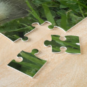 kleine gans in graszode legpuzzel (Zijkant)