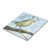 Kleine gele vogel die op een Tak wordt uitgevoerd  Tegeltje (Zijkant)