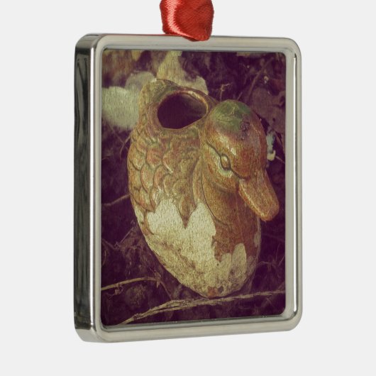 Kleine glazen knuppel die in een tuin zit metalen ornament (Rechts)