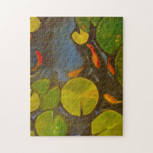 Kleine Goldfish Koi in Pond met Lily Pads Legpuzzel