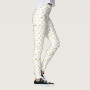 Kleine gouden schalen van rechtvaardigheid op wit leggings
