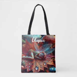 Kleine grillige fee die slaapt op een blad tote bag