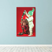 Kleine jongen die een hond versiert canvas afdruk (Insitu (Houten vloer))