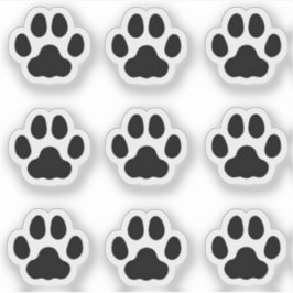 Kleine katteverf drukt zwarte wastikkers sticker