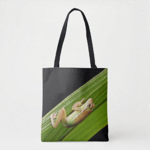 Kleine kikker op een blad tote bag