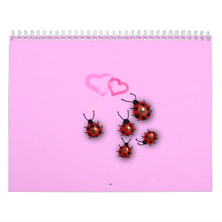 Kleine ladyvogels en droomroze landschap kalender