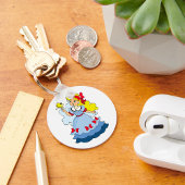 Kleine meid met een vlinder sleutelhanger