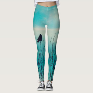 Kleine merel en een zachte blauwe lucht leggings