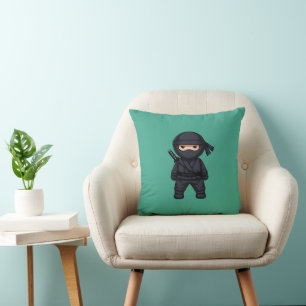 Kleine Ninja Krijger op Groen Kussen