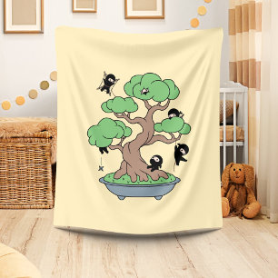 Kleine Ninjas in Bonsai-boom op Geel Fleece Deken