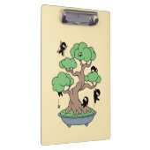 Kleine Ninjas in Bonsai-boom op Geel Klembord (Rechts)