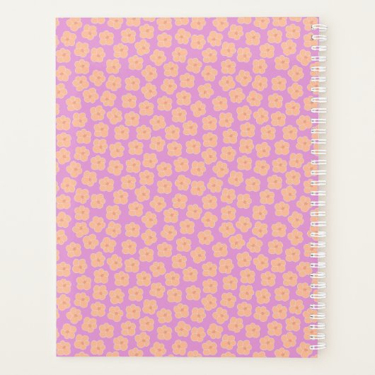 Kleine perzikkleurige bloemen op roze planner (Achterkant)