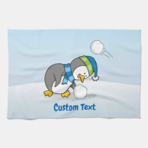 Kleine pinguïn die een sneeuwbal keukenhanddoek kr