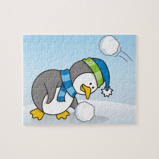 Kleine pinguïn die een sneeuwbal krijgt legpuzzel (Horizontaal)