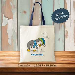 Kleine pinguïn die een sneeuwbal tas krijgt