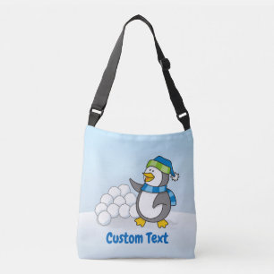 Kleine pinguïn met sneeuwballen zwaaiend met een d crossbody tas