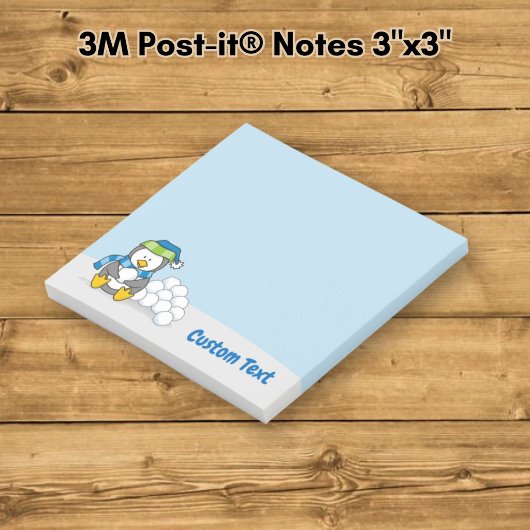 Kleine pinguïn zittend met sneeuwballen post-it® notes