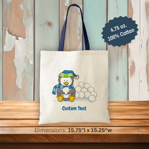 Kleine pinguïn zittend met sneeuwballen tote tas