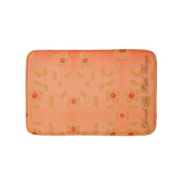 kleine platte vlekken met een peach in rood geacce badmat
