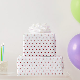 Kleine rode harten wit rood cadeaupapier