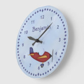 Kleine rode vliegtuigwandklok grote klok (Hoek)