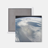 Kleine satellieten draaien boven een deel van de a magneet (Voorkant / Achterkant)