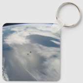 Kleine satellieten draaien boven een deel van de a sleutelhanger (Achterkant)