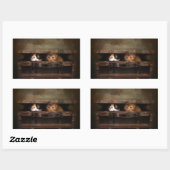 Kleine schattige kitten in een oude houten kist
 rechthoekige sticker (Vel)