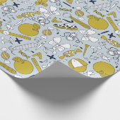 Kleine schooldingen verspreid over cadeaupapier (Hoek)