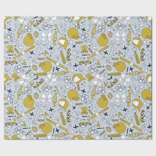 Kleine schooldingen verspreid over cadeaupapier (Zoom)