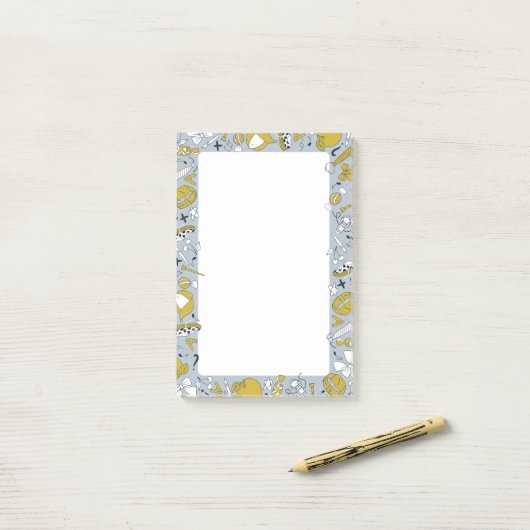 Kleine schoolspullen op de post-it® notes (Op bureau)