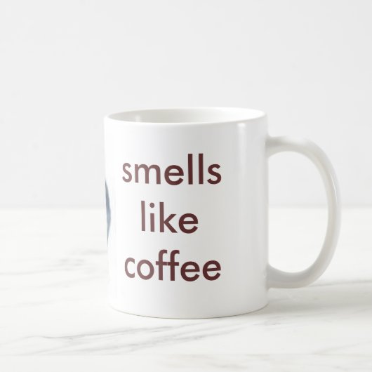 kleine sqirrel, ruikt naar koffie koffiemok (Rechts)