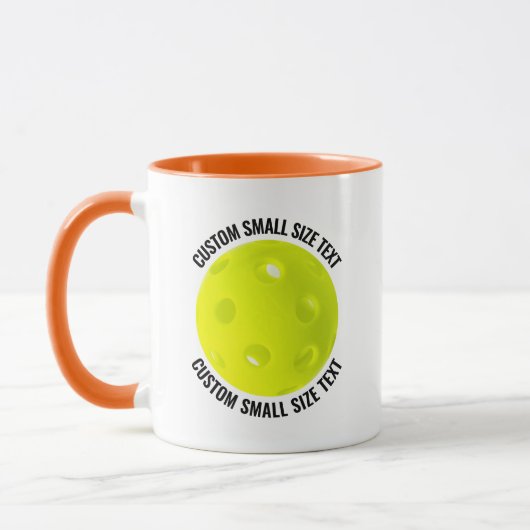Kleine tekst ORANJE Combo 11oz Douwpicklebal op ma Mok (Links)