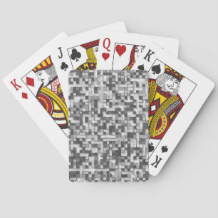 Kleine vierkantjes in grijze tinten worden gehuld  pokerkaarten