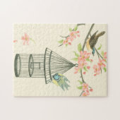 Kleine vogels op een bijkantoor en op een vogelkoo legpuzzel (Horizontaal)